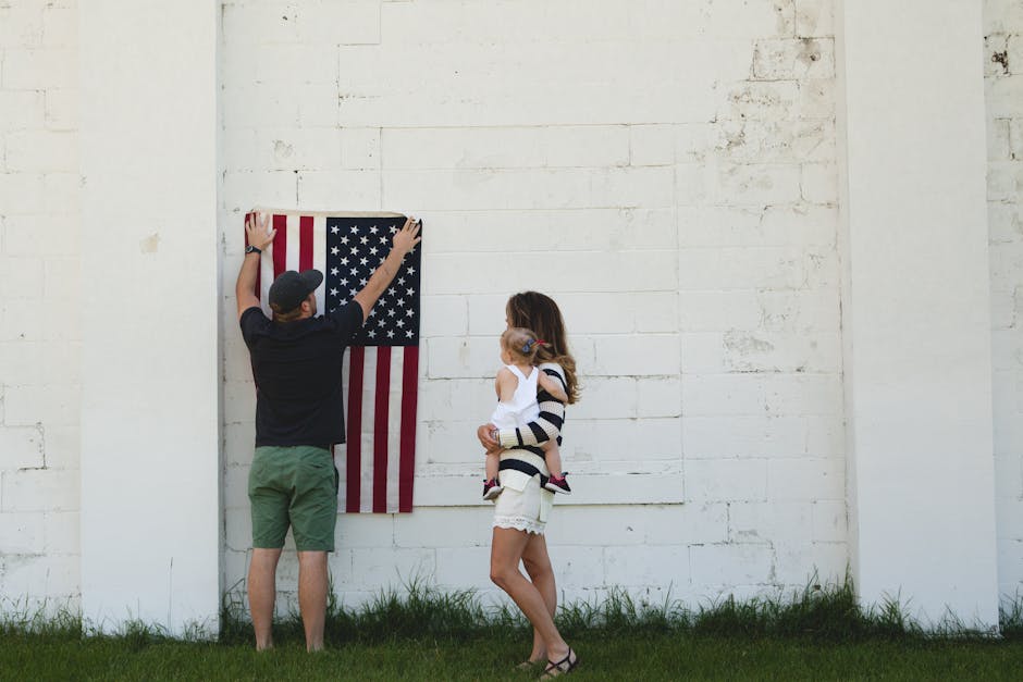Family putting up flag representing trust and community